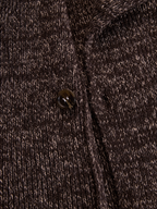 Chaqueta marrón de punto acanalado con cremallera asimétrica