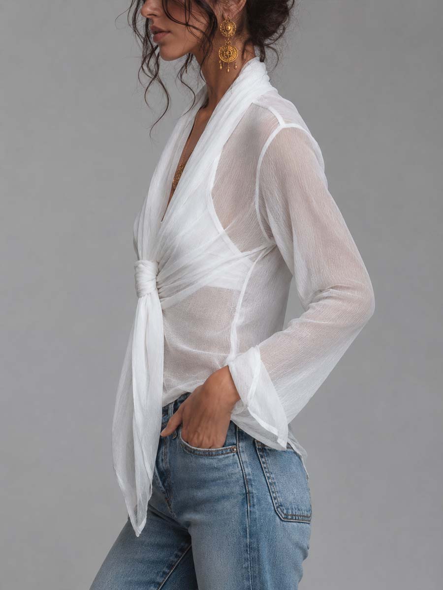 Blusa de gasa semitransparente arrugada con frente cruzado, lazo anudado, mangas largas y camisola