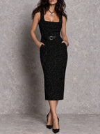Conjunto elegante retro de dos piezas con vestido de punto negro con brillo y cárdigan corto