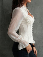 Blusa corsé romántica retro blanca con mangas transparentes y cuello con volantes