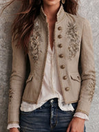 Chaqueta retro beige con cuello mao, bordado floral y ribete trenzado